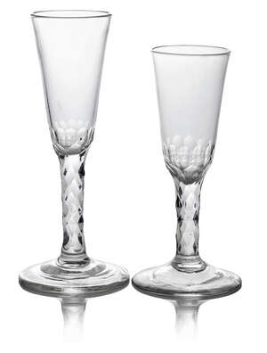 
	
		Two George III ale glasses, c. 1775, each with long tapering bowls with bridge cutting,...