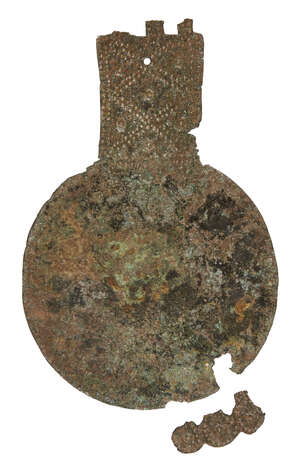 
	
		A Luristan bronze mirror North-West Iran, circa 8th-7th Century B.C formed from a single...