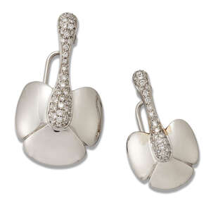 
	
		Chaumet, two brooch pins, by Chaumet, each designed as a stylised flower with pave...