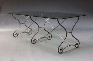 
	
		A large French wrought steel and glass dining table, late 20th Century, the rectangular...