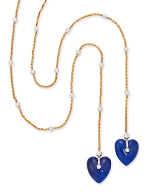 A lapis lazuli and diamond neck chain, of scarf style, composed of heart-shaped carved lapis...