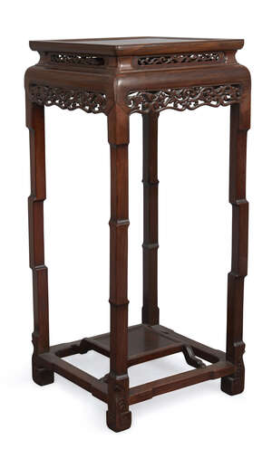 
	
		A Chinese hongmu square jardinière stand, early 20th century, with carved a pierced...