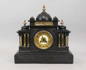 
	
		A Victorian black slate clock, the case of Classical architectural taste with three domed...