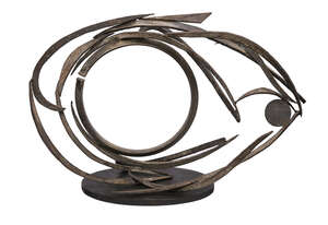 
	
		Lee Tribe,
		British/American b. 1945-
		 
		Eve's Eye, 1981;
		 
		steel with a wooden...
