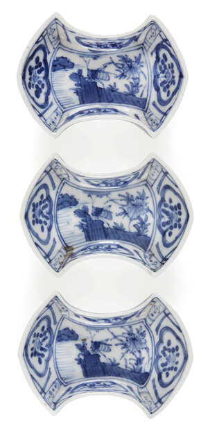 
	
		Three Japanese porcelain ingot shaped dishes, Meiji period, painted in underglaze blue...