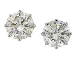 
	
		A pair of diamond single stone earstuds, the brilliant-cut diamonds in claw mounts

	

