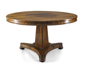 
	
		A Regency rosewood tilt top centre table, the circular top with bead moulded edge, on...