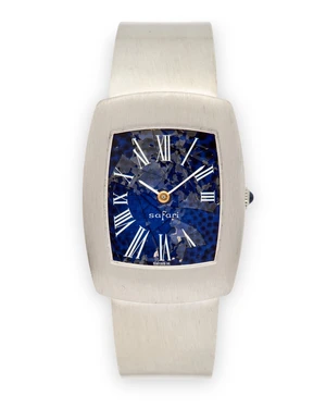 Safari. An 18ct white gold manual wind bangle watchLondon import marks for 1970Later fitted 17-jewel Blancpain manual wind movement, visibly damaged blue dial 