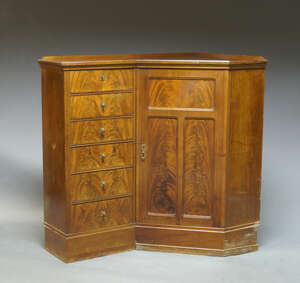 
	
		A Jugendstihl mahogany corner cupboard, possibly German, early 20th Century, with an...