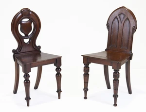 A Victorian mahogany hall chair, first quarter 19th century, with pierced back, on ring turned...