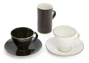 
	
		Dame Lucie Rie (1902-95), a stoneware cup and saucer 
		c.1960, impressed seal to base...