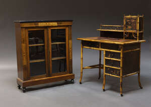 
	
		An Aesthetic movement bamboo kneehole desk, the raised back with single shelf and small...