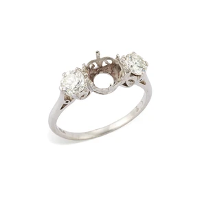 A diamond ring mount, composed of a central circular vacant collet, with brilliant-cut diamond...