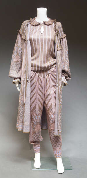 
	
		Bill Gibb for Annette Carol, a knitted trouser suite, the pale chocolate brown and pink...