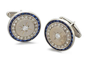 
	
		A pair of diamond and sapphire cufflinks, by Piccard, each with circular panel set in the...