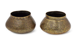
	
		Two small Veneto-Saracenic brass inlaid bowls, probably Mamluk Syria, 15th century, of...