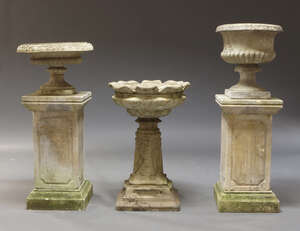 
	
		A reconstituted stone planter. late 20th Century, the bowl with foliate lip on...