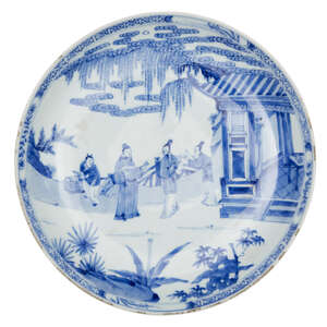A large Chinese porcelain dish, Yongzheng mark and period, painted in underglaze blue with a scene from 'The Romance of the Western Chamber', in which 