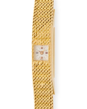 Vacheron & Constantin. An 18ct gold back winding bracelet watchCase number 408434, London import mark for 196417-jewel calibre 1005 back winding movement, stee