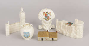 A crested china model of a scallop shell form flower vase, applied with the arms of Ramsgate, produced in commemoration of a Zepplin attack during World War I 
