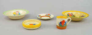 
	
		A Clarice Cliff coffee can and saucer, decorated with the crocus pattern, the cup 5cm...