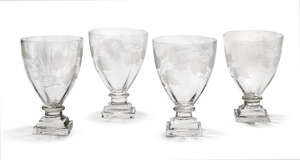 
	
		A set of four Regency cut glass rummers, engraved hops and barley, raised on stepped...