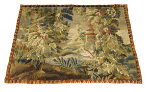 
	
		An Aubusson verdure tapestry fragment, 18th Century, depicting a landscape with a bird...