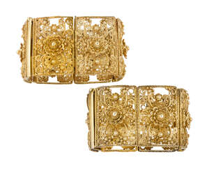 
	
		A pair of 19th century gold filigree bracelets, each composed of six rectangular openwork...