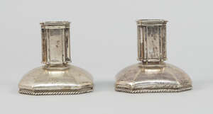 
	
		A pair of Chinese silver candlesticks, Daosing, first quarter 20th century, the square...