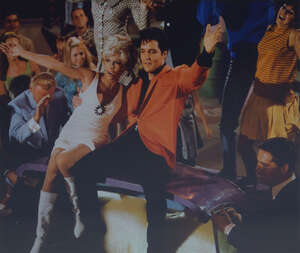 
	
		Elvis Presley and Nancy Sinatra, Speed Way 1968, a colour photographic reproduction,...