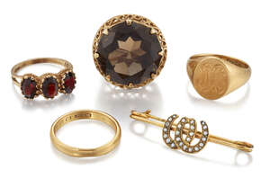 
	
		A group of jewellery, comprising: a smokey quartz single stone ring with pierced gallery...