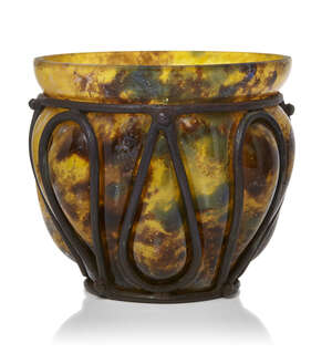 
	
		André Delatte (French c.1887-1953), a cased glass and wrought iron vase  
		c.1925,...