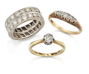 
	
		Three diamond rings, comprising: a circular-cut diamond twin row eternity, one single-cut...