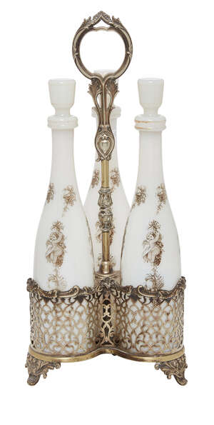 
	
		A silver plated metal decanter carrier, late 19th century,  with ring handle on long stem...