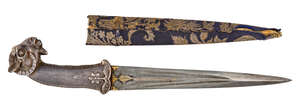 
	
		A silver-hilted ram's head dagger (khanjar) North India, 19th century, the steel blade of...