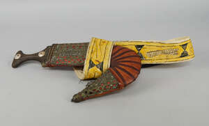
	
		A Middle Eastern dagger, late 19th/early 20th century, with bound leather sheath overlaid...