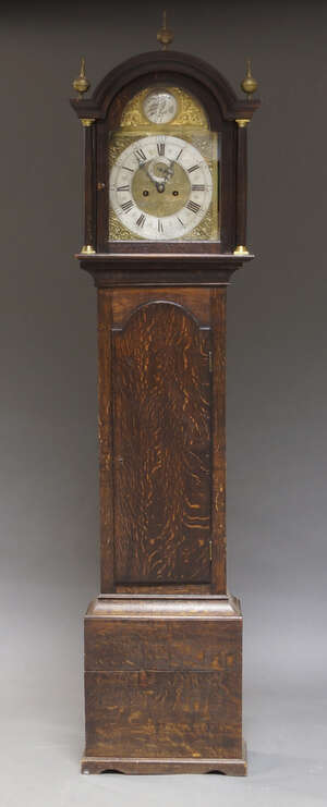 
	
		A George III oak longcase clock, by John Kirby, with domed hood having three brass ball...