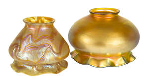 
	
		Bohemian, an iridescent glass shade in the style of Loetz 
		c.1900
		Having a frilled...