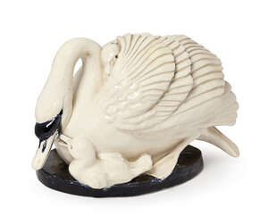 
	
		An Earthenware Swan and Cygnet group, first half 20th Century, modelled as swan with two...