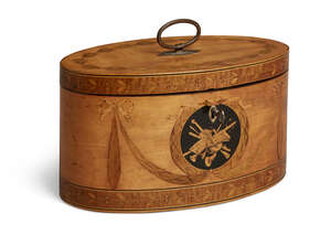 
	
		A George III satinwood oval inlaid two-division tea caddy, inlaid with musical trophies...