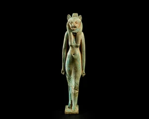 A large Egyptian blue-green faience amulet of the lioness-headed goddess Sekhmet, Third...
