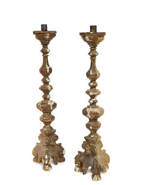 
	
		A pair of French parcel-gilt and polychrome wood altar candlesticks, 19th century, each...