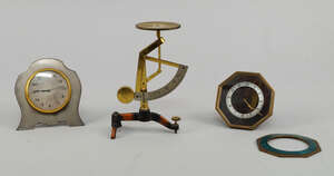 
	
		An 8 day travelling alarm clock with a silver frame, 20th century, with silvered dial...
