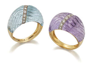 
	
		Two 18ct gold, carved gem and diamond saddle design cocktail  rings, each with carved...