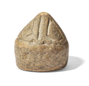 
	
		A carved stone weight in the form of a dome, Iran, 11th-15th century, on a flat base,...