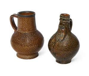 
	
		A Frechen salt glazed stoneware Bellermine jug, 17th century,  18cm high, together with...