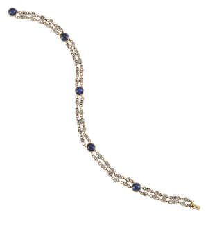 An Edwardian, sapphire and diamond bracelet, of fine chain-link design set with rose cut diamond collets and five collet-set cabochon amethyst spacers in gold 