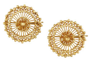 A pair of brooches, of openwork stylised flowerhead design with faceted bead detail, width 2.6cm