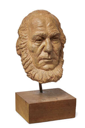 
	
		A terracotta bust of Alexandr Solzhenitsyn, 1970s, on hardwood base with typed paper...