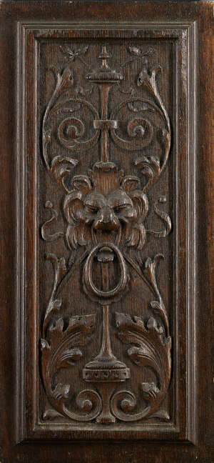 
	
		A carved oak Gothic relief panel, late 15th/early 16th century, with tracery decoration,...